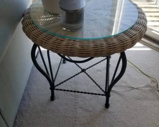 Wicker end table with glass top & wrought iron base
