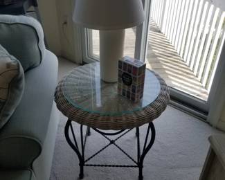 Wicker end table with glass top & wrought iron base
