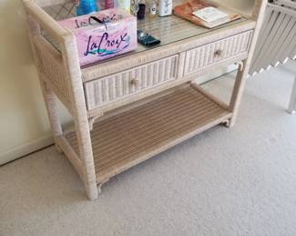 Wicker two-drawer buffet with glass top