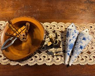 Nut cracker, bone knives with antler holder, and wall hangings