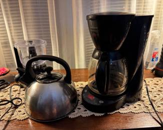 Appliances such as a coffee maker, kettle, and food processor