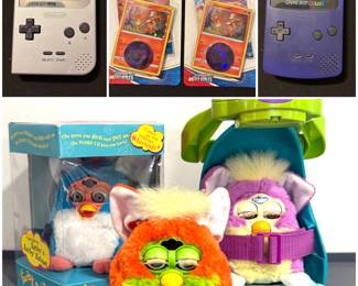 Collection of 90s nostalgia including a Game Boy pocket, Game Boy Color, sealed Pokemon trading cards, and Furby plush toys. 