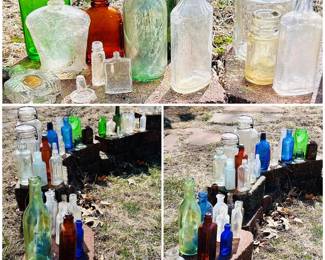 A huge collection of  vintage glass bottles and jars