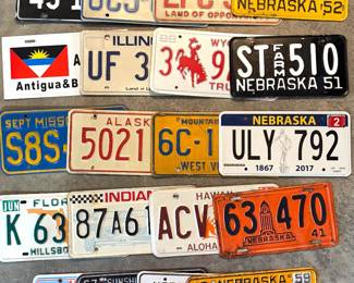 A collection of vintage license plates  