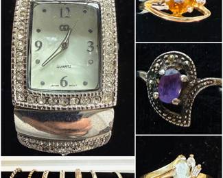 A collection of 14k and sterling silver rings and bracelets 