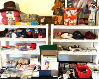 Crafting and sewing supplies including yarn and sewing patterns