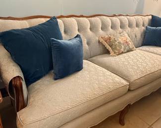 Southern Furniture Company Tufted Sofa with French Provincial Style Wood Trim