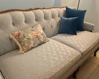 Southern Furniture Company Tufted Sofa with French Provincial Style Wood Trim