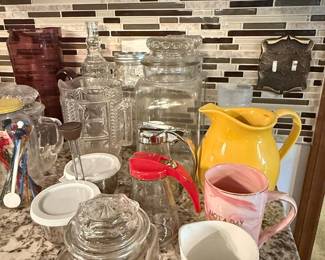 Assorted Kitchen Glassware and Ceramic Pitcher and Mugs