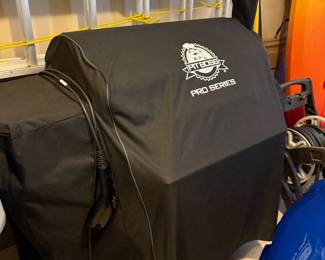 Put Boss Smoker Grill with griddle attachment. Smoker chip box and cover. Comes with bags of smoker chips/pellets. 