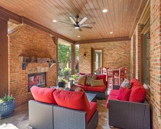 Outdoor seating group with cushions and matching coffee table 