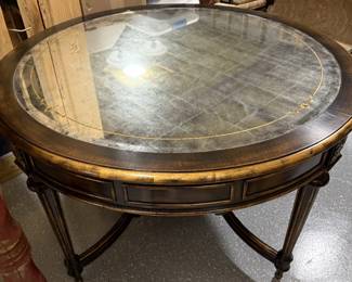 John Richard designer round coffee table.