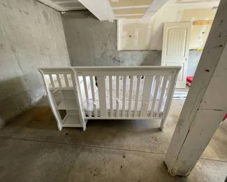 Crib with changing table and storage