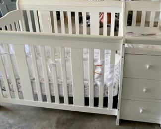 Crib with changing table and storage