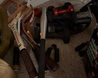 Tennis rackets, baseball bat, hand weights