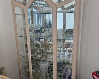 Located in Rockledge off of Viera boulevard, very heavy light wood curio cabinet with light