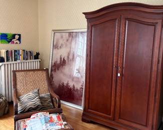 Wardrobe with mirror on interior door.