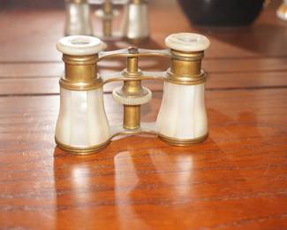 Victorianera opera glasses made with motherofpearl inlay and brass.