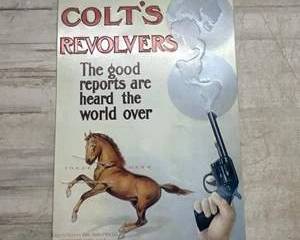 Colt’s Revolvers Embossed Metal Advertising Sign Rearing Horse Firearms