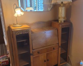Oak Secretary desk drop front writing surface flanked with two curio cabinets 