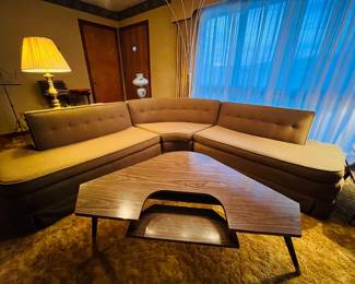 MID CENTURY AVOCADO SECTIONAL AND ATOMIC COFFEE TABLE