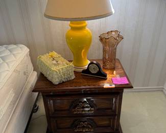 Pair of night stands with vintage bright yellow lamps