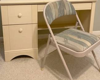 Cream Colored Desk and Folding Chair