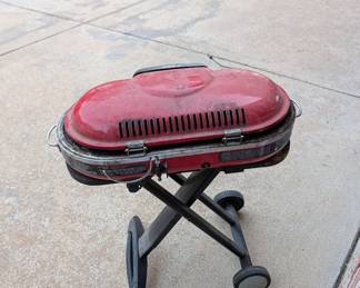 R55 - $125. Coleman RoadTrip Propane Grill on Folding Stand.
