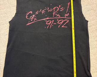 R92 - $100. Guns N' Roses T-Shirt 1991/92. XL? Sleeves & Neck have been cut.