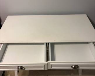 R7 - $30. White Desk. Measures 44" wide x 20.5" x 31.25". Sturdy but shows a lot of wear. 2 drawers - both roll easily.