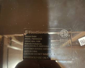 R74 - $25. FoodSaver Vacuum Sealer. Model FM2435-ECR.