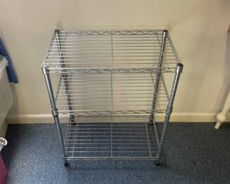 R25 - $20. Small Metal Wire Shelf. Measures 24" x 14" x 30" tall.