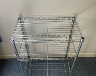 R25 - $20. Small Metal Wire Shelf. Measures 24" x 14" x 30" tall.