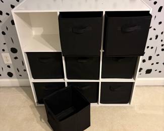 R6 - $30. 9 Cube Storage with boxes. Measures 36" wide x 11.5" deep x 36" tall.