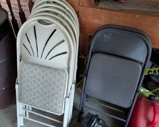 R56 - $30. 6 Padded Off White Folding Chairs