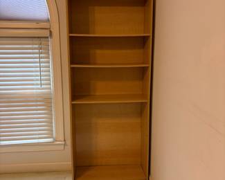 R4 - $15. Blonde Pressed Wood Bookcase. Measures 28.5" x 11.5" x 71" tall. It does have another shelf it was just laying on the bottom!