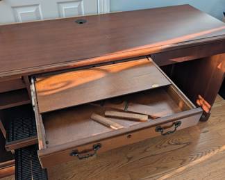 R46 - $150. Hooker Furniture L Shaped Office Desk from Furnitureland South. Right inside the door for easy loading. HEAVY! Bring help to load. Shows some light wear but sturdy!