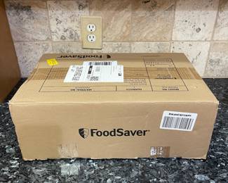 R74 - $25. FoodSaver Vacuum Sealer. Model FM2435-ECR.