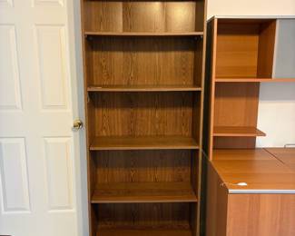R3 - $15. Pressed wood bookcase. Measures 30" wide x 11.75" deep x 71.5" tall.