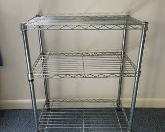 R25 - $20. Small Metal Wire Shelf. Measures 24" x 14" x 30" tall.