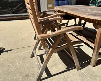 R58 - $1250. Teak Patio Table with *10* adjustable chairs. Table has 2 butterfly leaves stored inside. Needs a little muscle to pull apart. 4 chairs have been stored inside and look brand new. The 6 that were outside have been covered but the bottom of the feet are dirty and weathered (just need cleaned up!) All sturdy. Table is 39" wide x 73" long. Chairs are 24" wide.