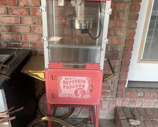 R15 - $50. "Funtime" Popcorn Maker Model FT860CR/UE40010. Has some sun fading and needs a good cleaning! Has been stored on a screened in porch / covered.