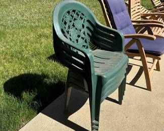 R60 - $25. Set of 4 Plastic Stacking Chairs.