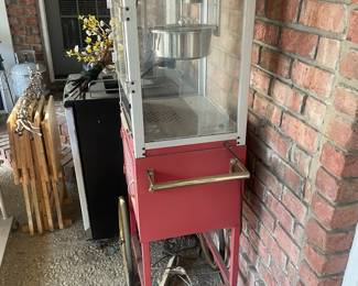 R15 - $50. "Funtime" Popcorn Maker Model FT860CR/UE40010. Has some sun fading and needs a good cleaning! Has been stored on a screened in porch / covered.