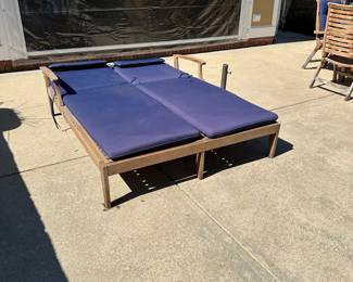 R57 - $450. Teak Double Chaise. Measures 61" wide x 80" long. Has been stored covered but there is a little dirt around the feet. Each side adjusts separately! Cushions are still useable.