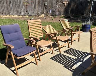 R58 - $1250. Teak Patio Table with *10* adjustable chairs. Table has 2 butterfly leaves stored inside. Needs a little muscle to pull apart. 4 chairs have been stored inside and look brand new. The 6 that were outside have been covered but the bottom of the feet are dirty and weathered (just need cleaned up!) All sturdy. Table is 39" wide x 73" long. Chairs are 24" wide.
