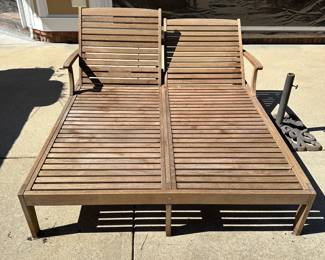 R57 - $450. Teak Double Chaise. Measures 61" wide x 80" long. Has been stored covered but there is a little dirt around the feet. Each side adjusts separately! Cushions are still useable.