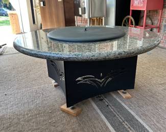 *** Retail was 2k-2500. Propane Firepit. Oriflamme Tables by Designing Fire. Measure 42" round x 19.5" tall. Includes small propane tank. Has only been used on a covered porch - not weathered!R13 - $1250. Oriflamme Tables by Designing Fire - Propane Firepit. Measure 42" round x 19.5" tall. Includes small propane tank. Has only been used on a covered porch - not weathered!