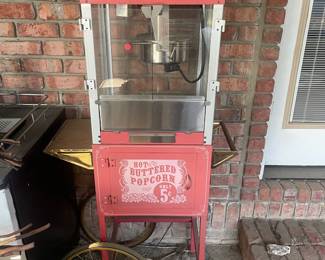 R15 - $50. "Funtime" Popcorn Maker Model FT860CR/UE40010. Has some sun fading and needs a good cleaning! Has been stored on a screened in porch / covered.