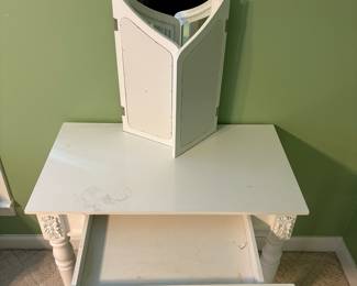 R18 - $40. Small White Vanity. Has some damage on the top - see photos. Measures 32" wide x 18" deep x 29.75" tall (48" tall with mirror)